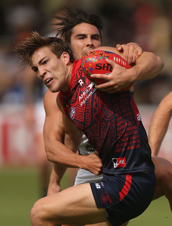 AFL 2016 Rd 10 - Melbourne v Port Adelaide ALICE SPRINGS, AUSTRALIA - MAY 28: Jack Viney of the Demons is tackled by Chad Wingard of the Power during the 2016 AFL Round 10 match between the Melbourne Demons and Port Adelaide Power at TIO Traeger Park on May 28, 2016 in Alice Springs, Australia. (Photo by Sean Garnsworthy/AFL Media)